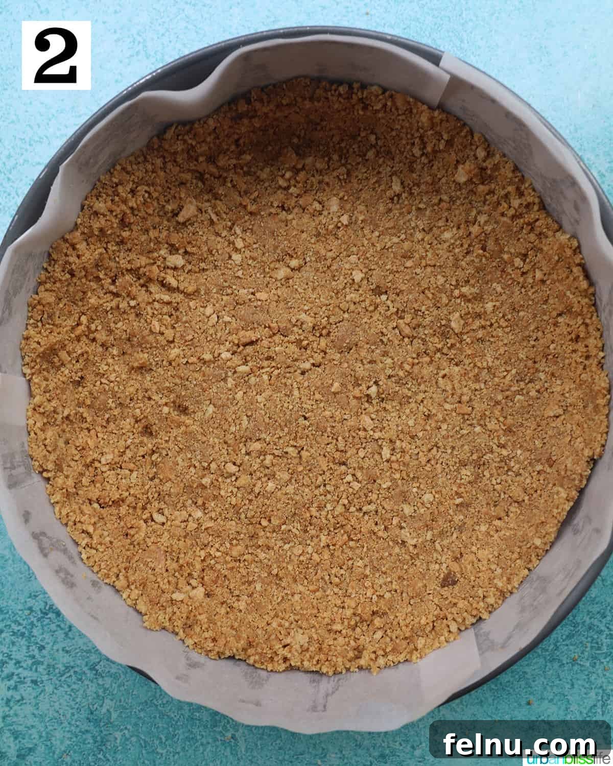 Easter Egg Delight Cheesecake 12 The cookie crust pressed into a springform pan.