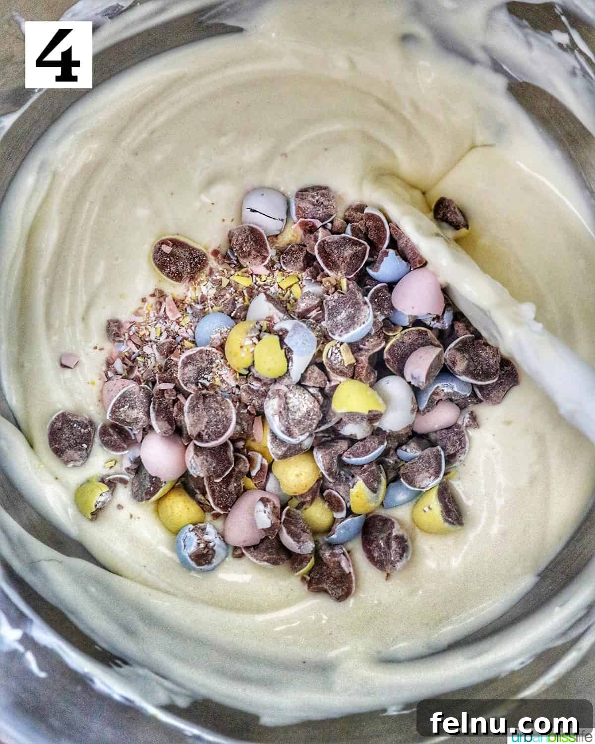 Easter Egg Delight Cheesecake 16 Folding in the chopped mini eggs.