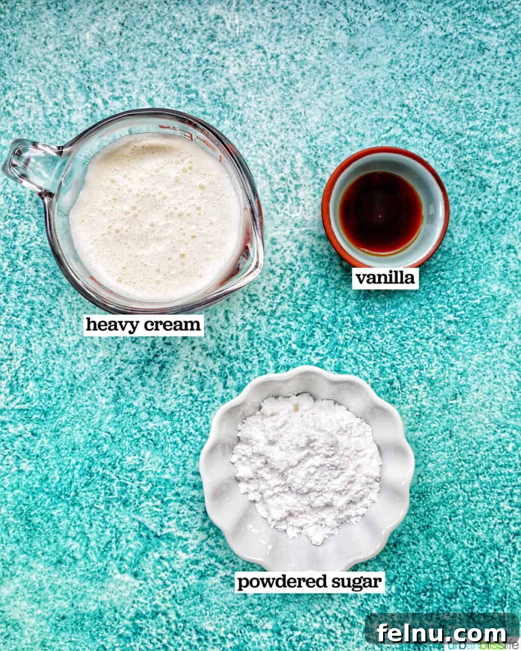 Easter Egg Delight Cheesecake 6 Ingredients for the whipped topping: heavy cream, powdered sugar, and vanilla extract.