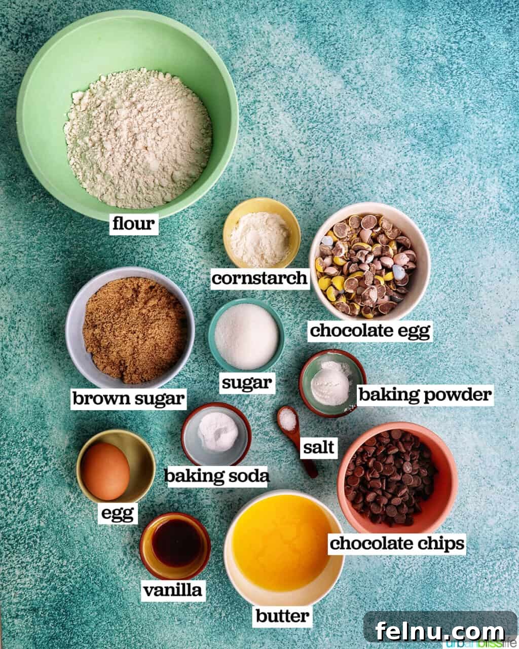 Effortless Mini Egg Cookies 4 Bowls filled with all the essential ingredients laid out neatly, ready to be transformed into delicious mini egg cookies.