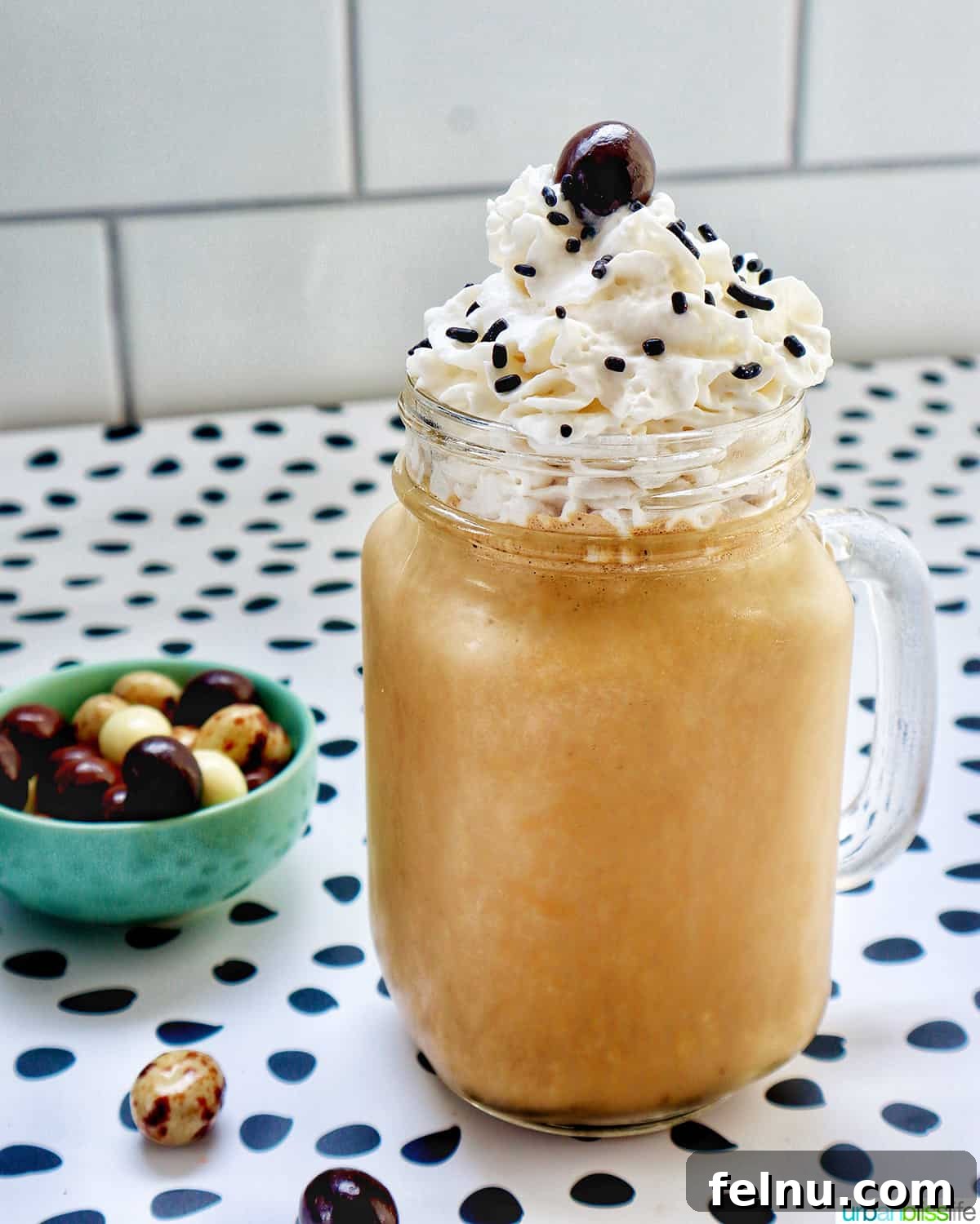 Close-up of a Coffee Milkshake with whipped cream and chocolate espresso beans
