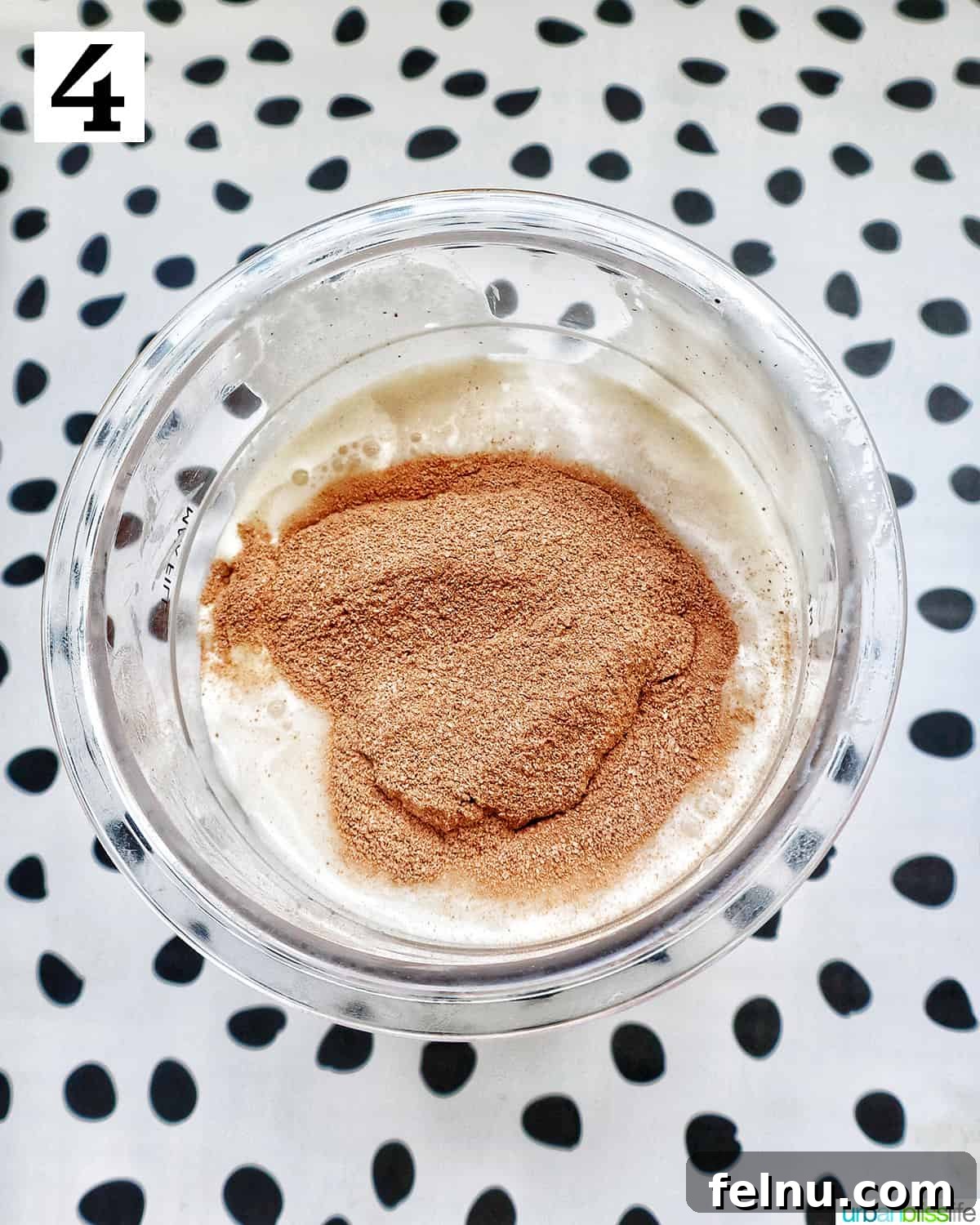 Adding cocoa powder to the ice cream