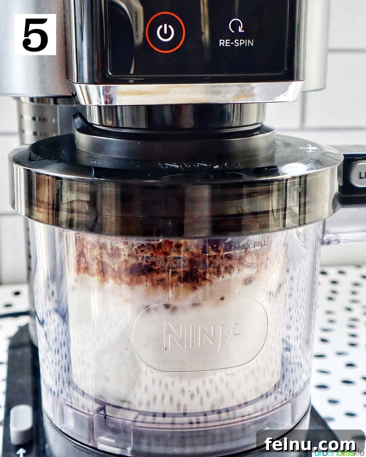 Ninja Creami processing the milkshake