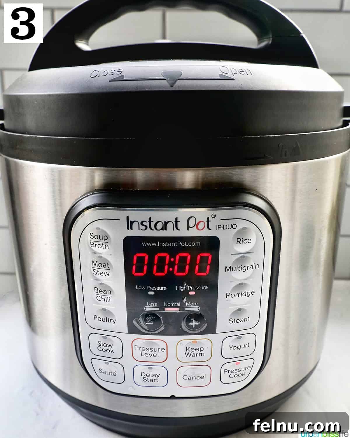 Closing the Instant Pot lid and setting the pressure release valve.