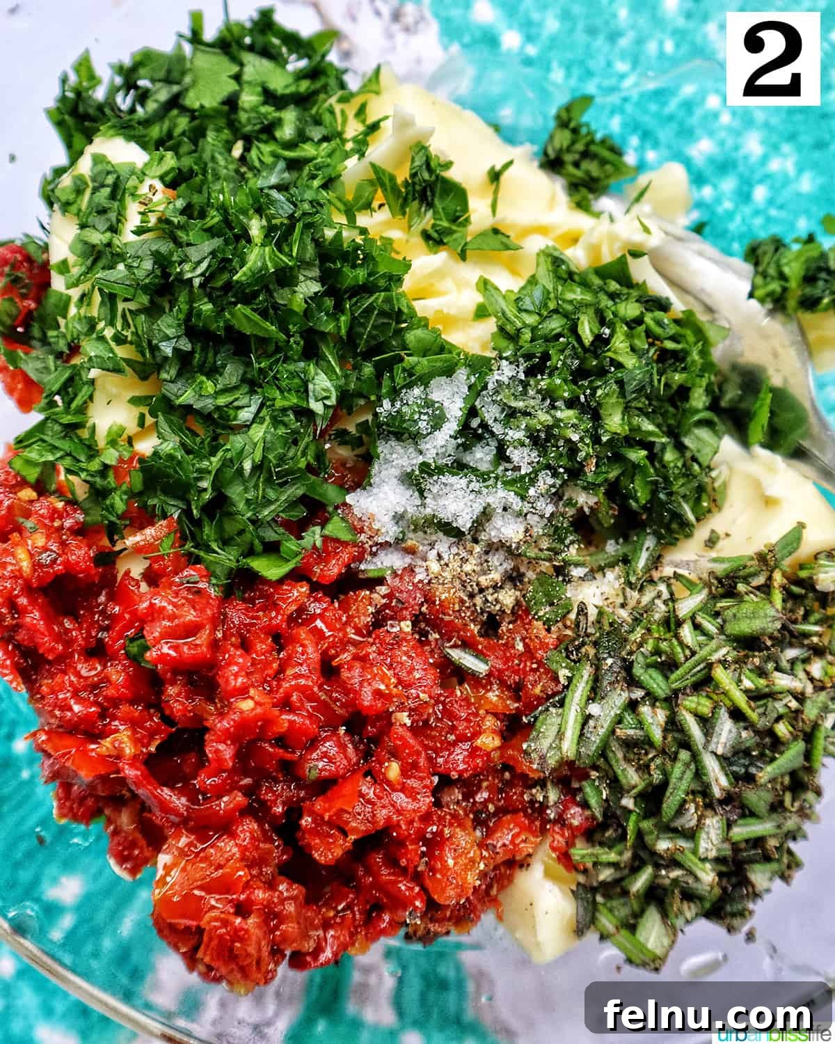 Ingredients for sun-dried tomato butter in a bowl.