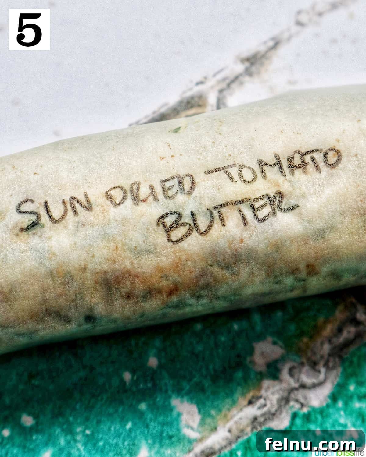 Sun-dried tomato butter wrapped and labeled.