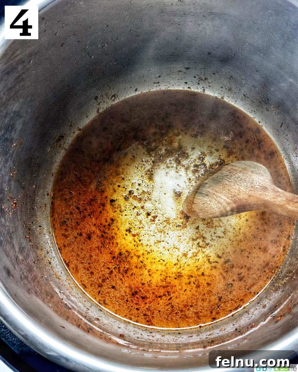 Instant Pot Chicken Legs 11 Chicken broth in the Instant Pot after deglazing.