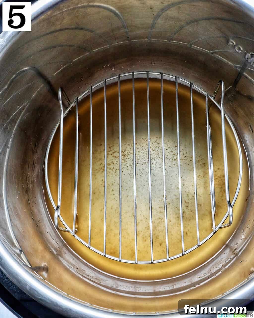 Instant Pot Chicken Legs 12 Trivet placed in the Instant Pot.