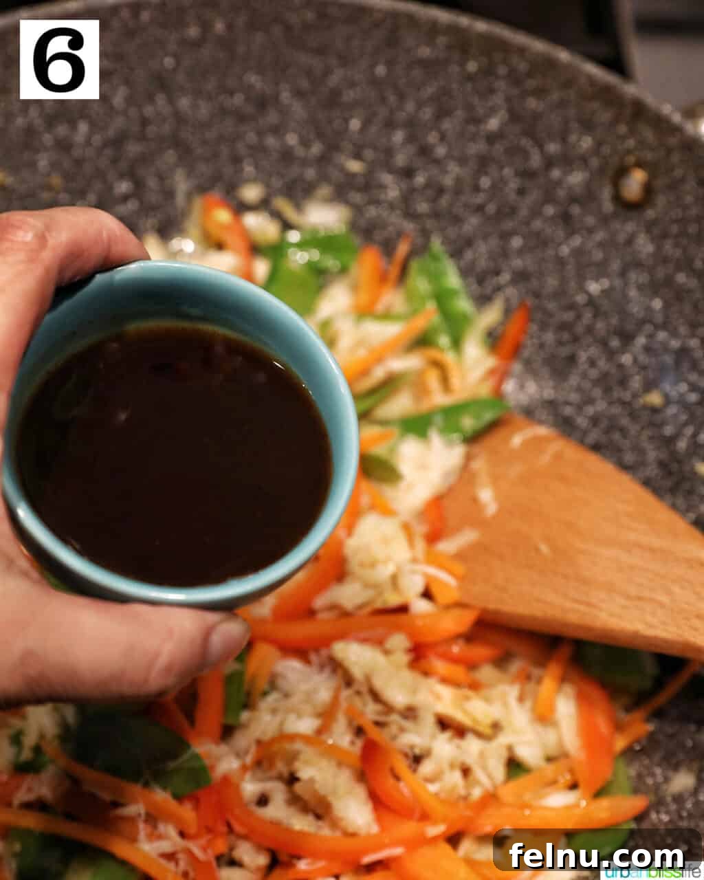 Crab Noodle Stir-Fry 11 Adding Sauce to the Wok