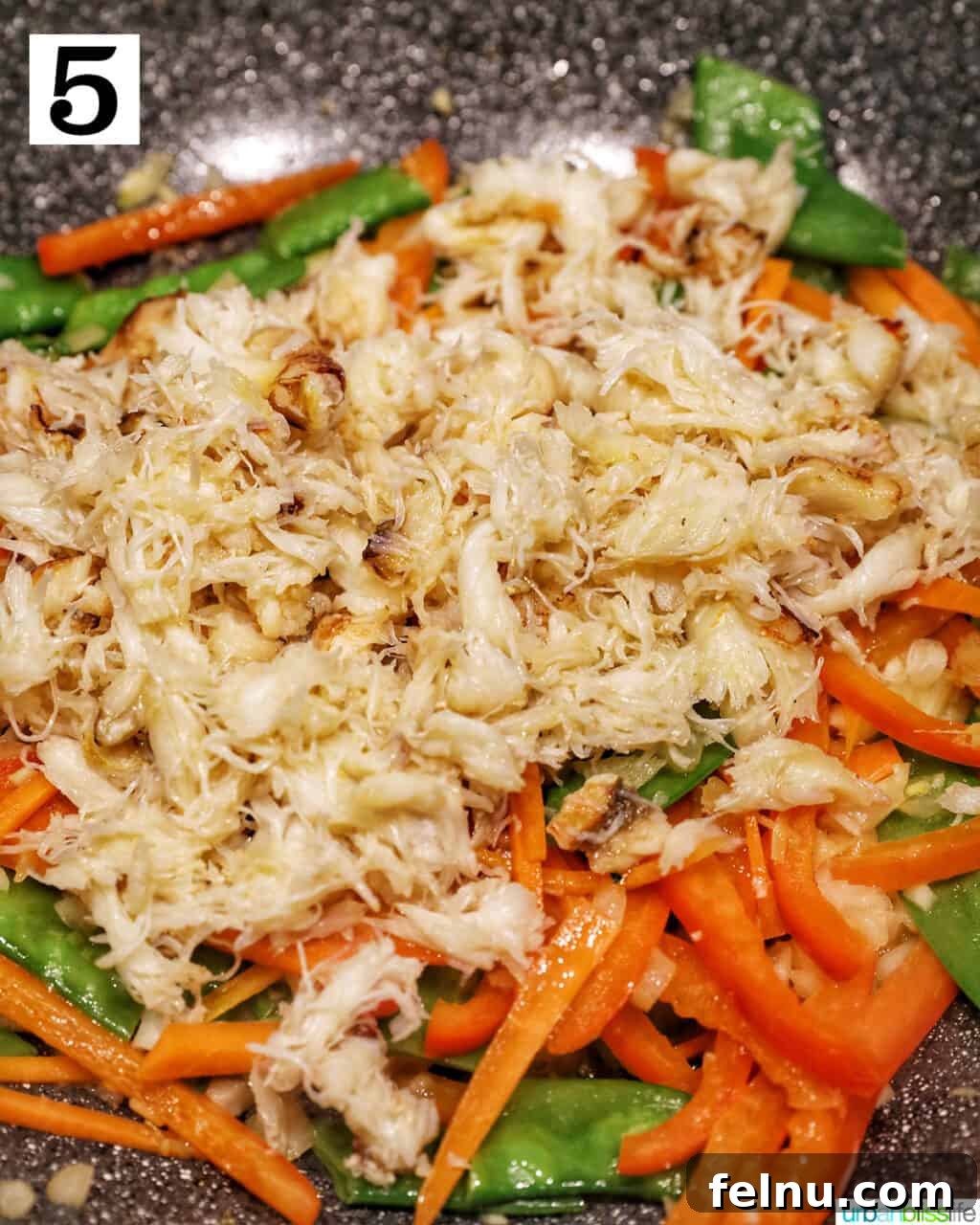 Crab Noodle Stir-Fry 10 Adding Cooked Crab Meat Back to the Wok