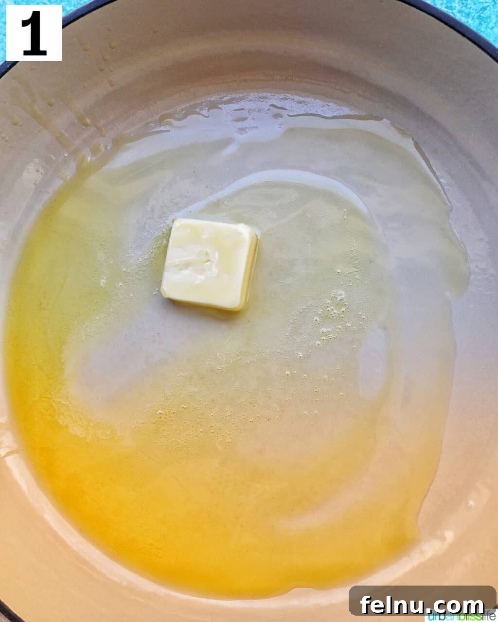 Melting butter and olive oil in a pan.