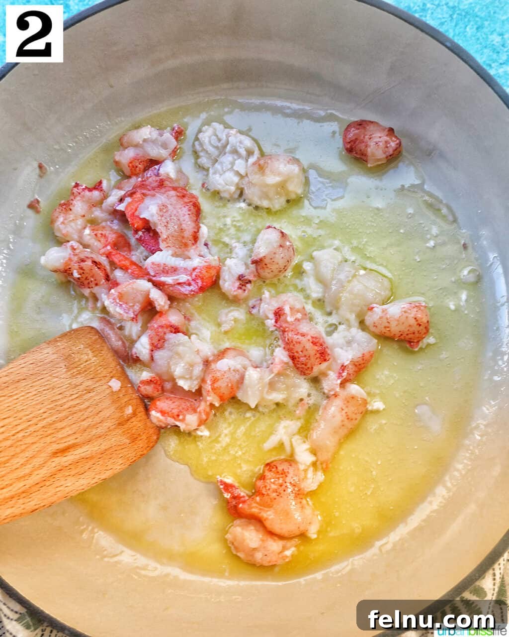 Cooking lobster meat in butter and olive oil.