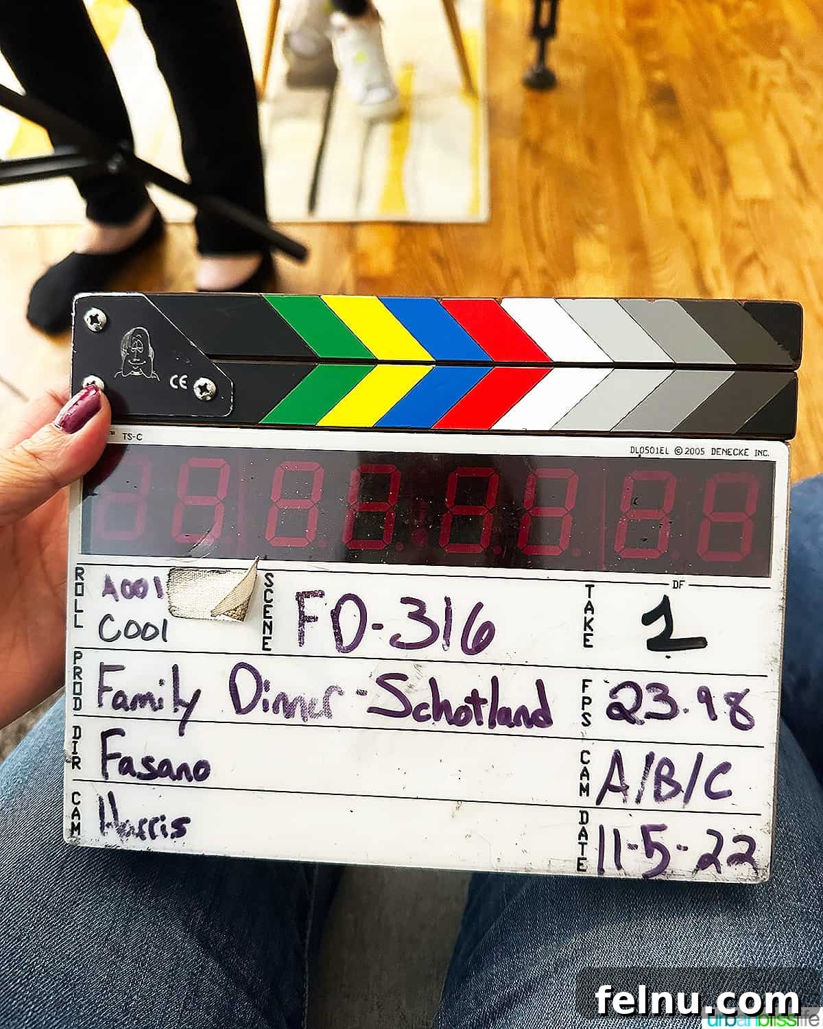 Dinner with the Jayme-Schotlands 4 Director's slate for the Jayme-Schotland episode of Family Dinner TV Show, displaying episode details like date, scene, and take numbers.