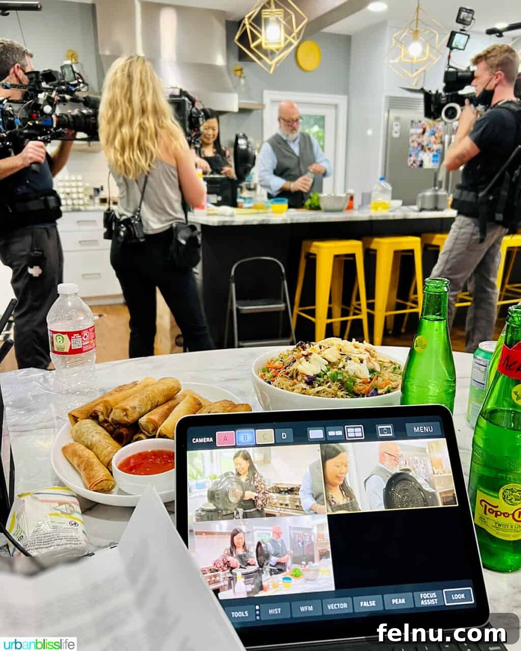 Dinner with the Jayme-Schotlands 7 Behind-the-scenes shot of cameras and extensive production equipment meticulously set up for filming in a cozy home environment.