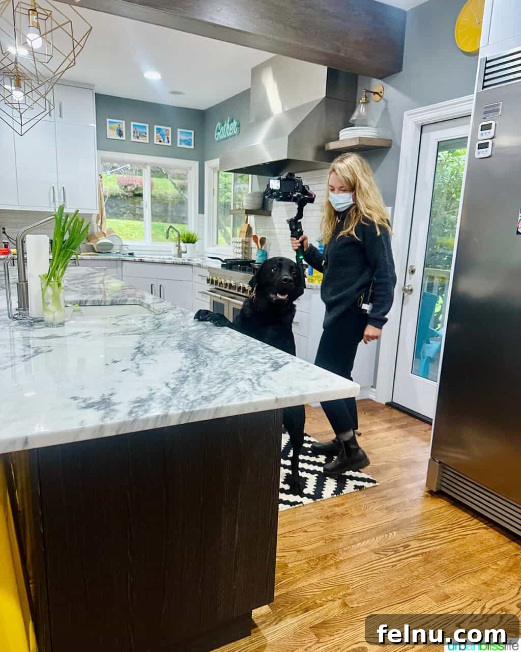 Dinner with the Jayme-Schotlands 9 A dedicated crew member, Ace, working diligently and professionally in the kitchen during the Family Dinner TV show shoot, ensuring perfect shots.