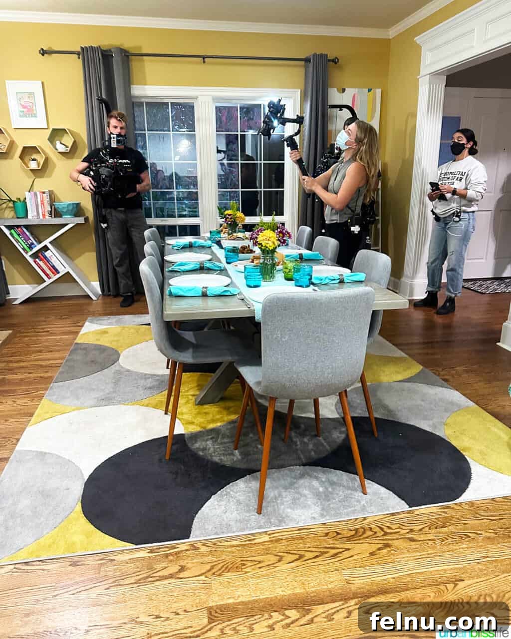 Dinner with the Jayme-Schotlands 10 Behind-the-scenes view of the diligent production crew setting up cameras and lighting in our dining room for the Family Dinner TV show, transforming it into a set.