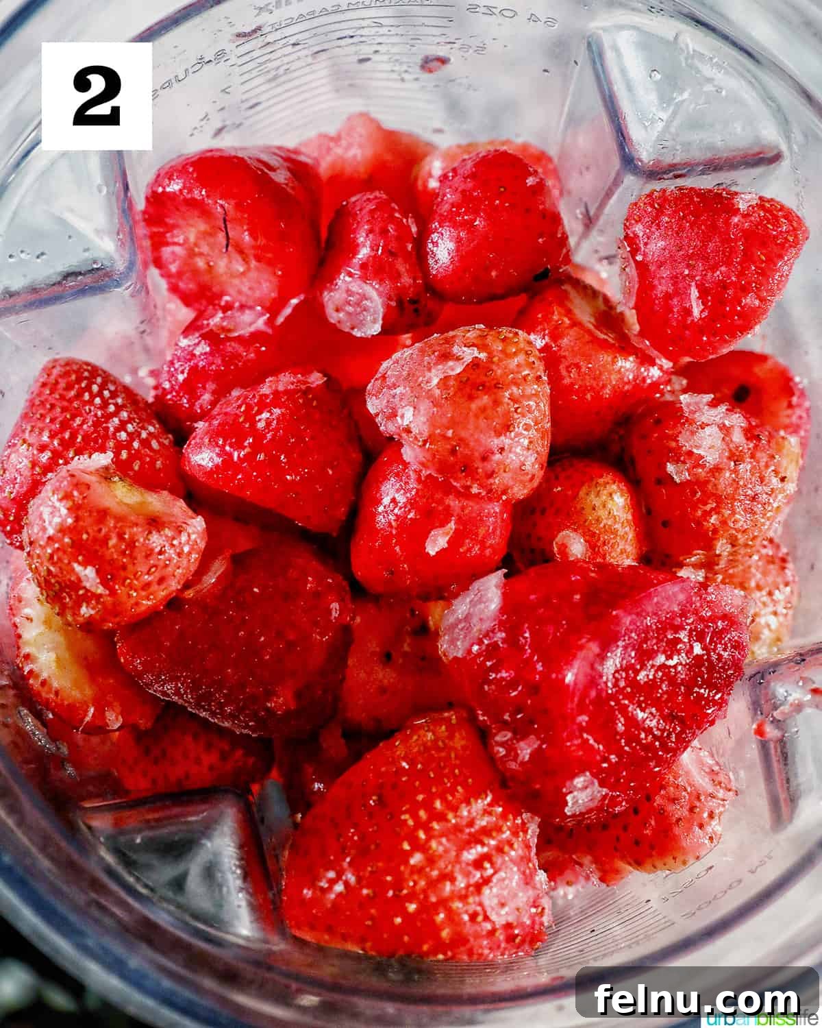 Strawberry Watermelon Refresher 6 Strawberries inside a blender.