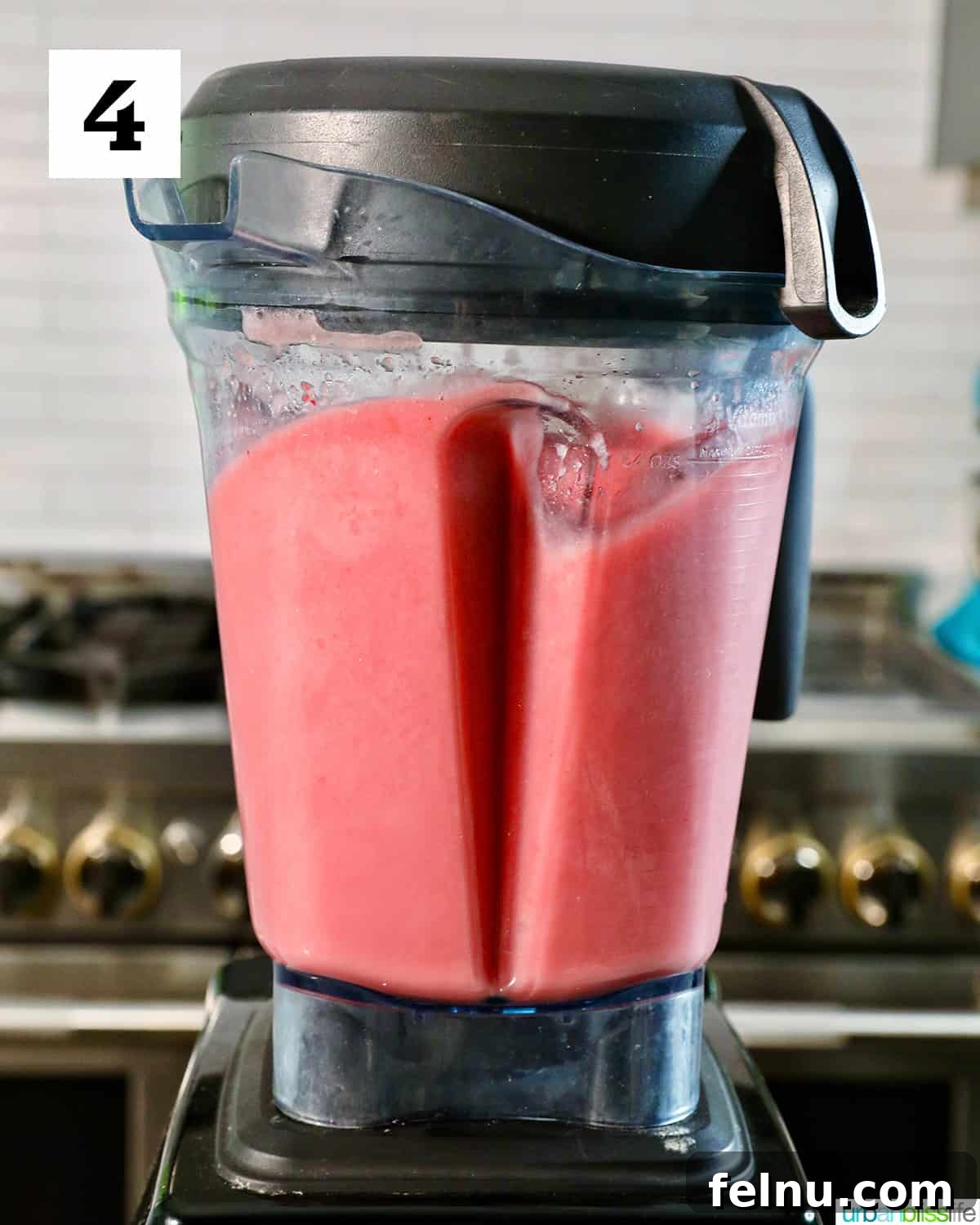 Strawberry Watermelon Refresher 8 Strawberry watermelon smoothie being blended in a blender.