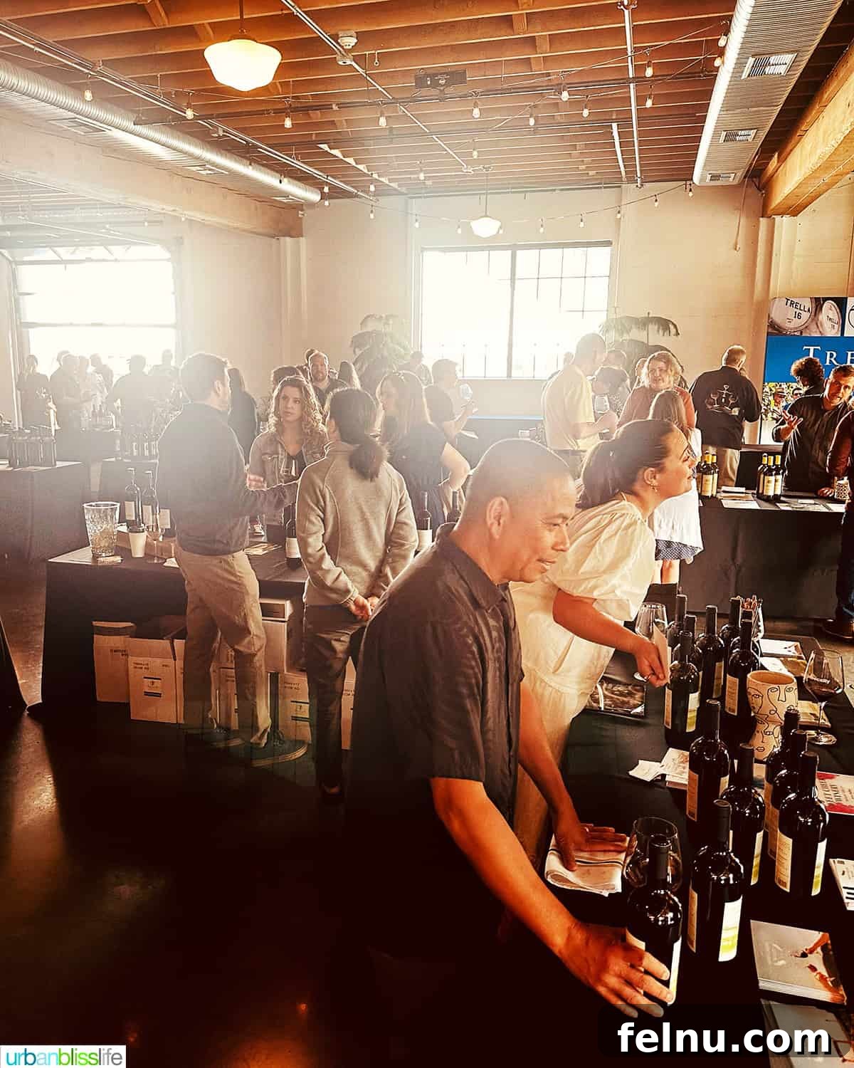 Malbec Takes Root: Oregon's Unexpected Wine Story 4 Winemaker of Sweet Cheeks Winery at the Malbec in the city table with crowd.