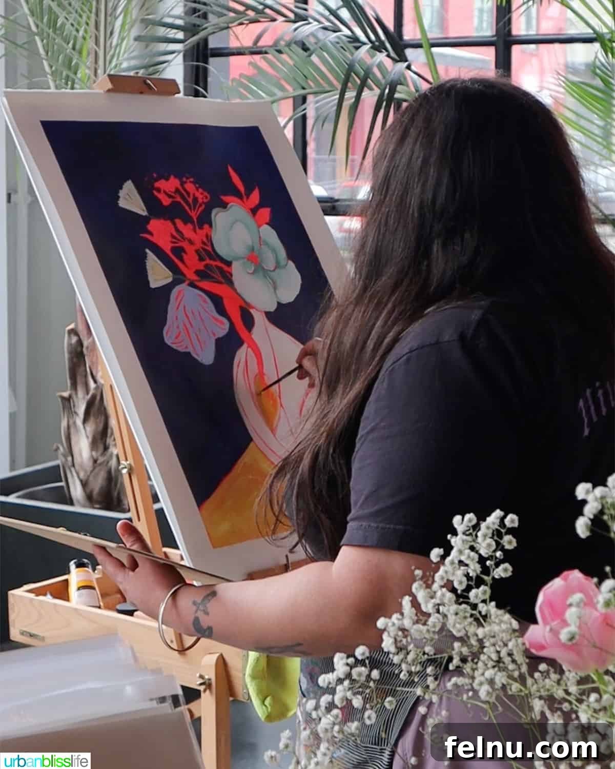 Malbec Takes Root: Oregon's Unexpected Wine Story 9 Xochilt Ruvalcaba artist live painting at Malbec in the City.
