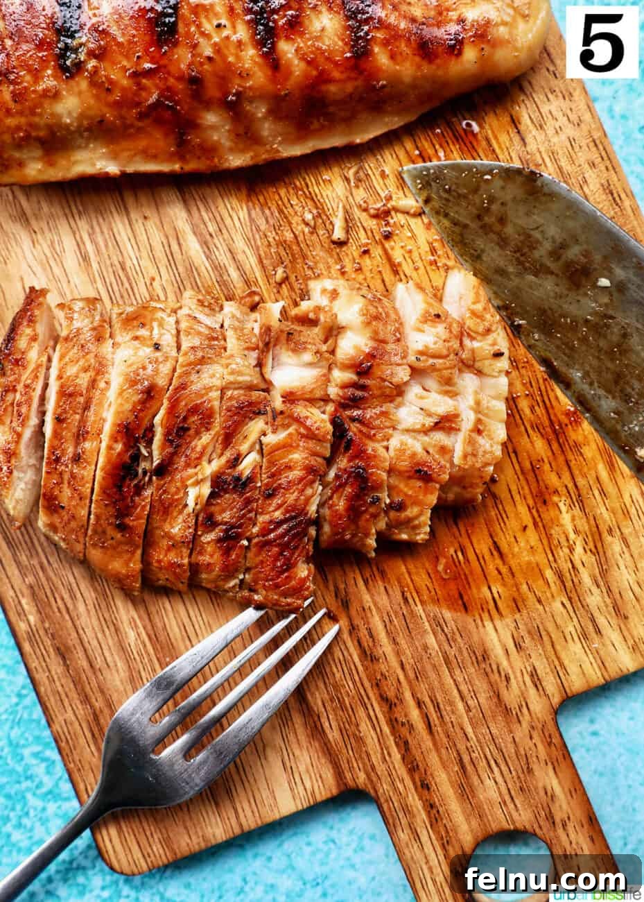 Chicken Teriyaki Bowl 11 Slicing grilled teriyaki chicken breasts