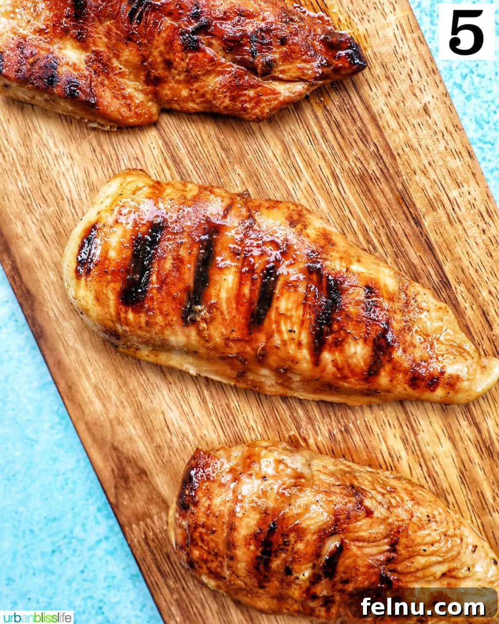 Chicken Teriyaki Bowl 10 Grilled teriyaki chicken breasts on a wooden board