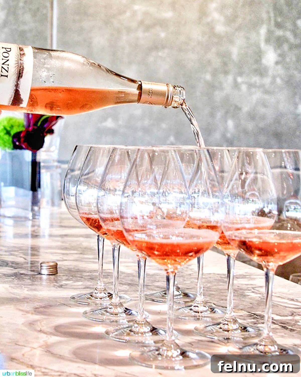 The Perfect Pairing: Wine and Turkey 6 A bottle of Ponzi rosé wine being poured into elegant wine glasses.