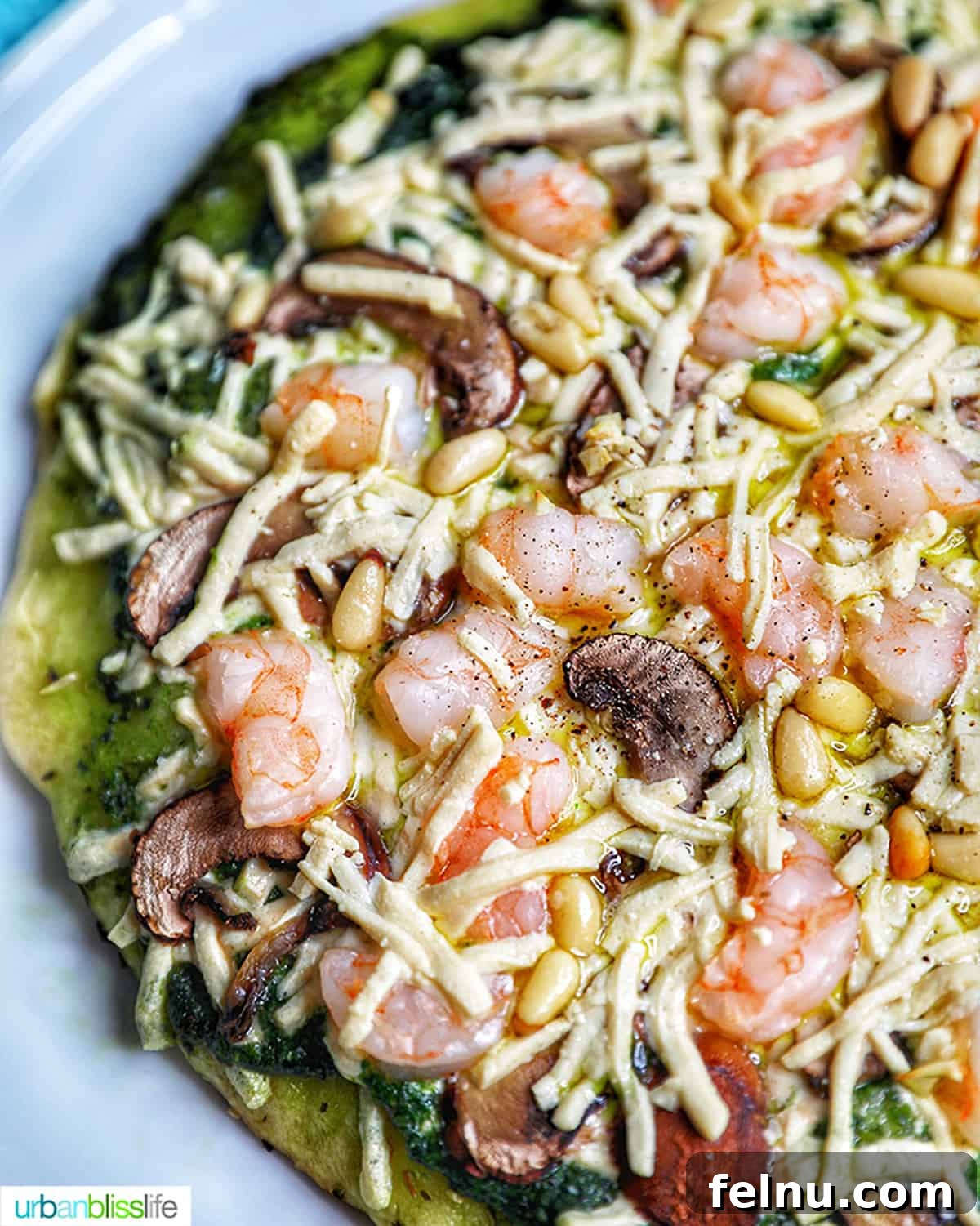 Pairing Pizza Perfection: The Ultimate Wine Guide 8 A shrimp pesto pizza, highlighting the vibrant green pesto sauce and the succulent shrimp.
