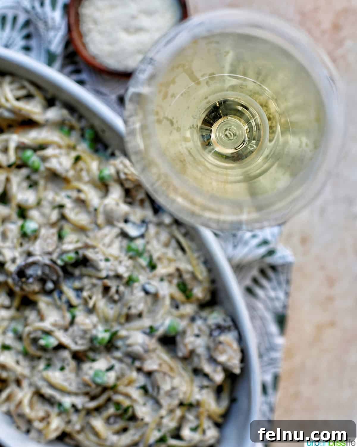 Chardonnay's Culinary Companions 3 Turkey Tetrazzini in serving dish with glass of white wine
