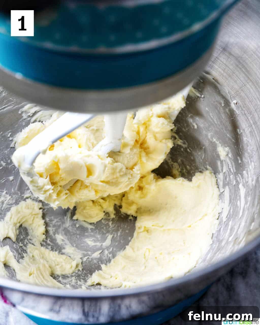Effortless Vanilla Bean Buttercream 5 Creaming butter in a stand mixer