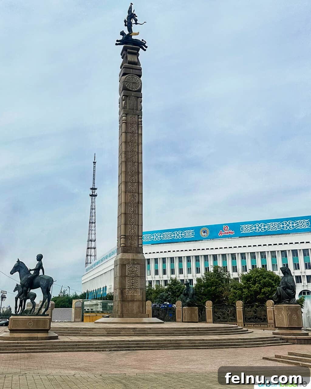 Explore Almaty: Thirty Unforgettable Things to Do 16 The towering Monument of Independence stands proudly in Republic Square in Almaty, Kazakhstan, a symbol of national pride.