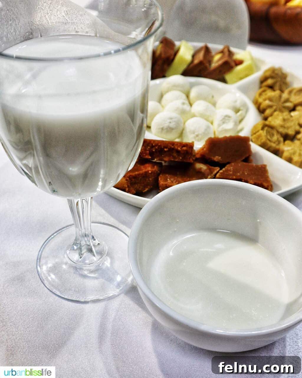 Explore Almaty: Thirty Unforgettable Things to Do 18 Glasses of camel's milk and mare's milk, traditional beverages in Almaty, Kazakhstan, offering a unique taste experience.