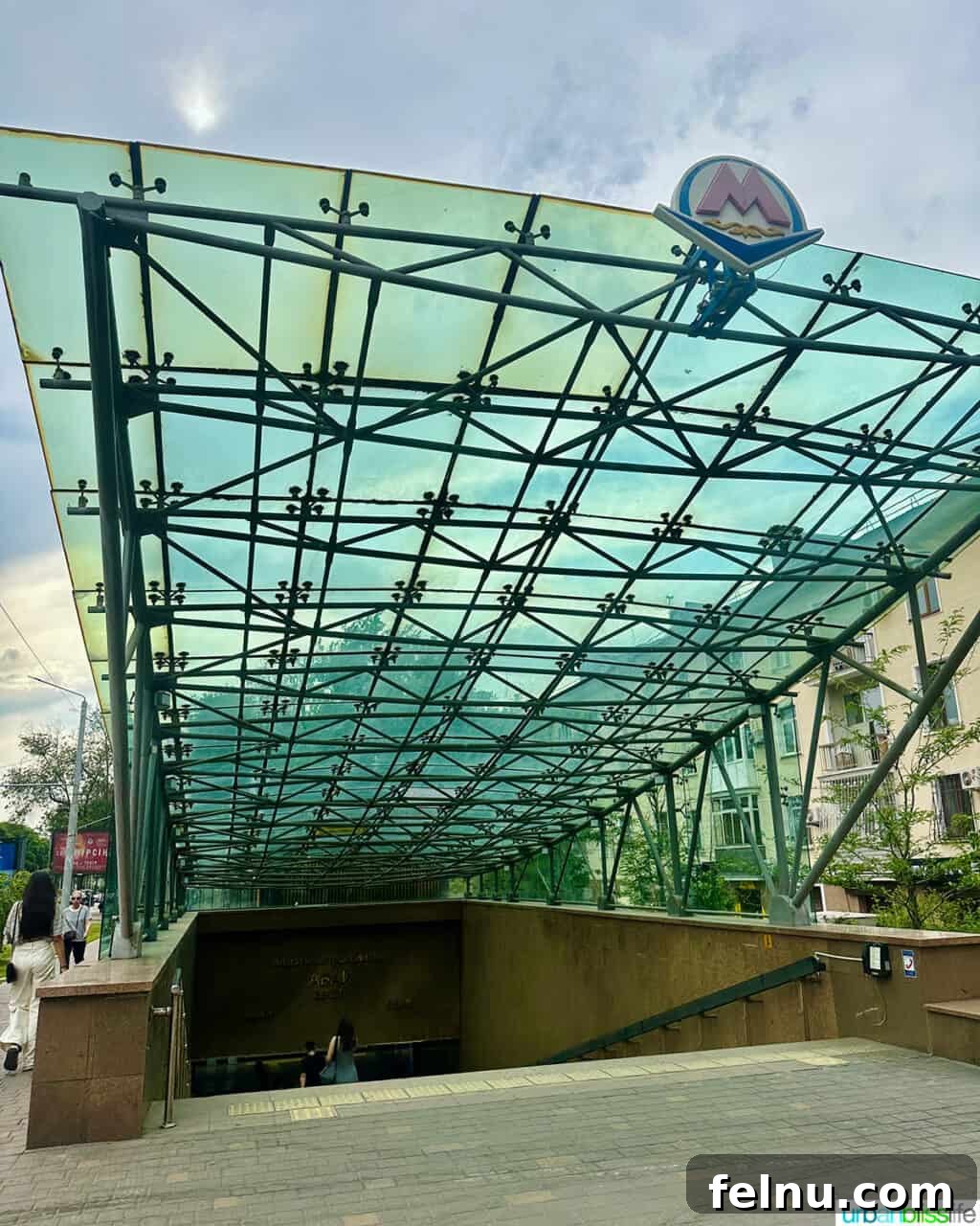 Explore Almaty: Thirty Unforgettable Things to Do 32 The modern and inviting exterior of an Almaty subway station, showcasing its unique architectural design.