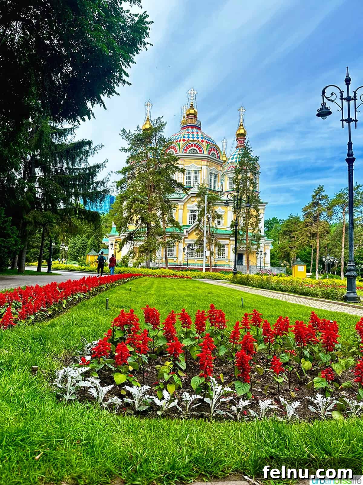 Explore Almaty: Thirty Unforgettable Things to Do 9 Beautifully vibrant flowers in bloom within Panfilov Park in Almaty, Kazakhstan, adding to the park's tranquil ambiance.