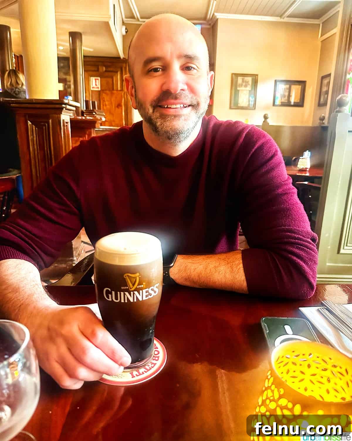 The Emerald Isle in a Week: Your Ultimate Ireland Itinerary 4 Drinking a Guinness at Hannigan's Bar & Restaurant in the International Hotel in Killarney, Ireland