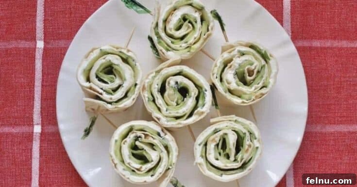 Cucumber and cream cheese sandwich rolls.