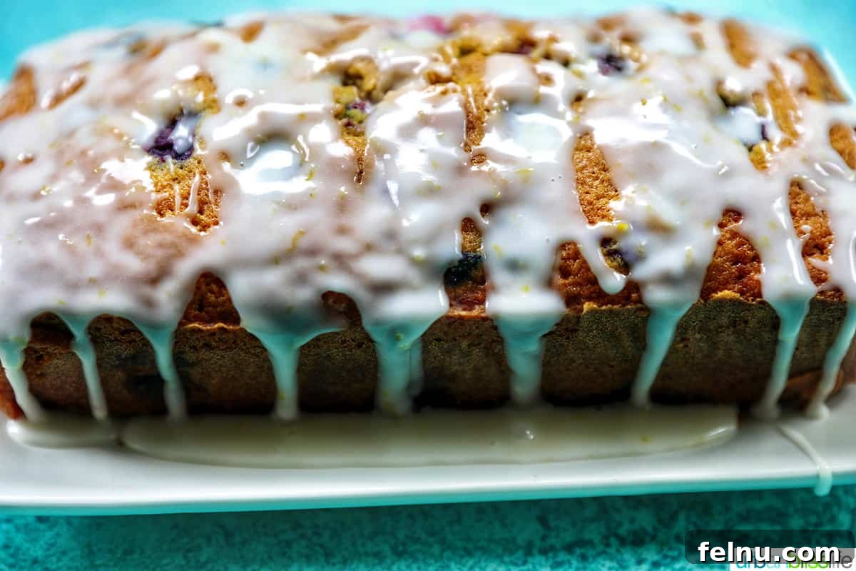 A close-up shot of the lemon glaze, showcasing its smooth texture and bright citrusy color.