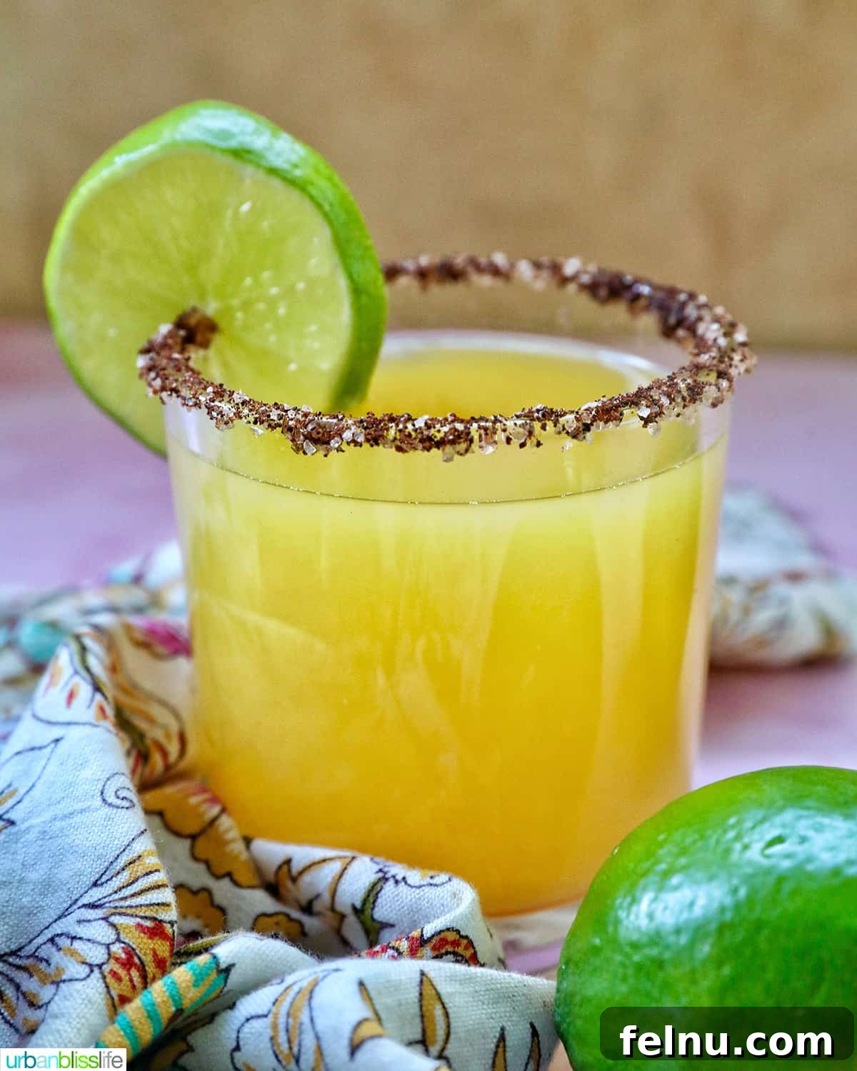 Spicy Mango Tango 2 Refreshing Spicy Mango Margarita with Lime Garnish