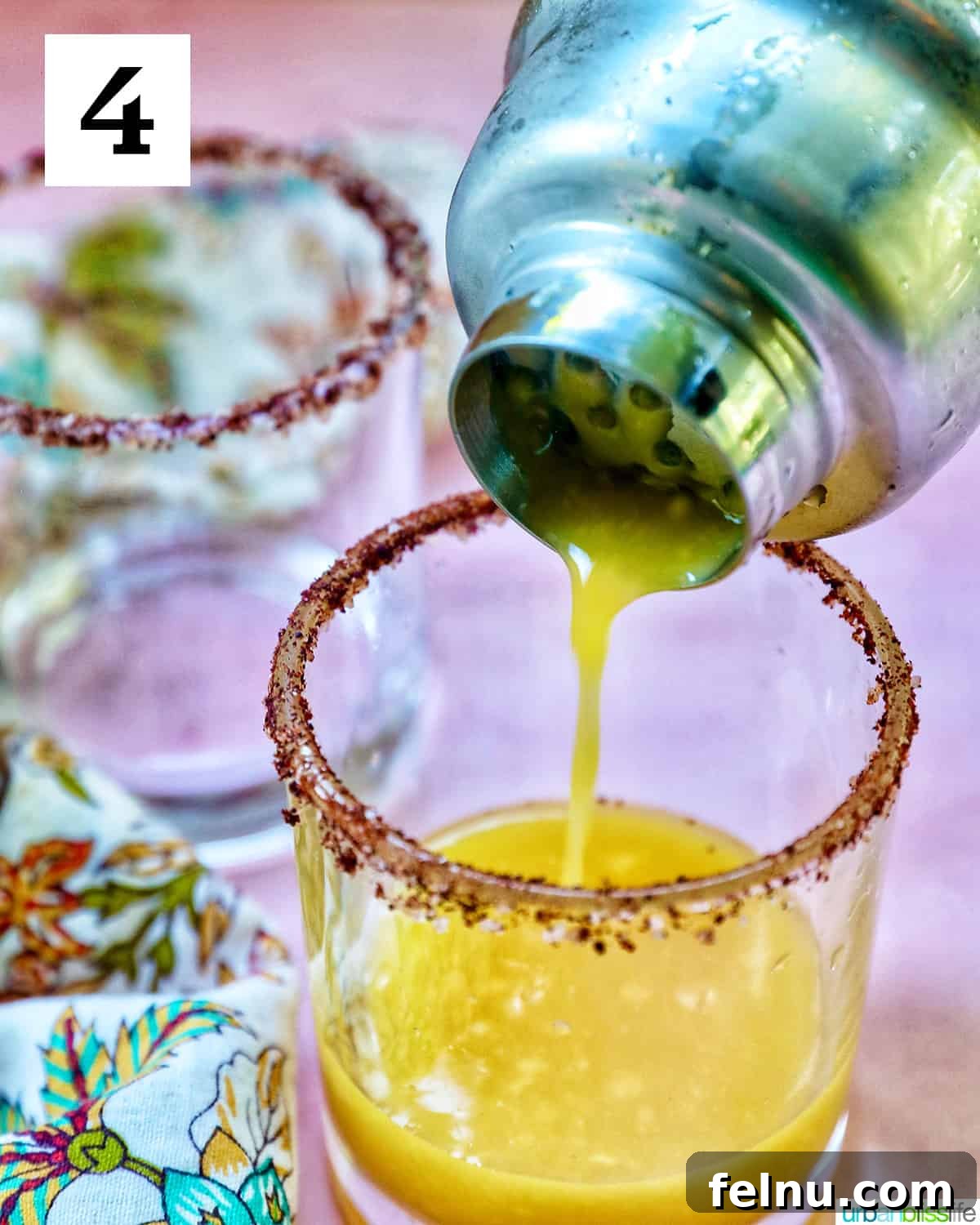 Spicy Mango Tango 12 Pouring Spicy Mango Margarita into Glass