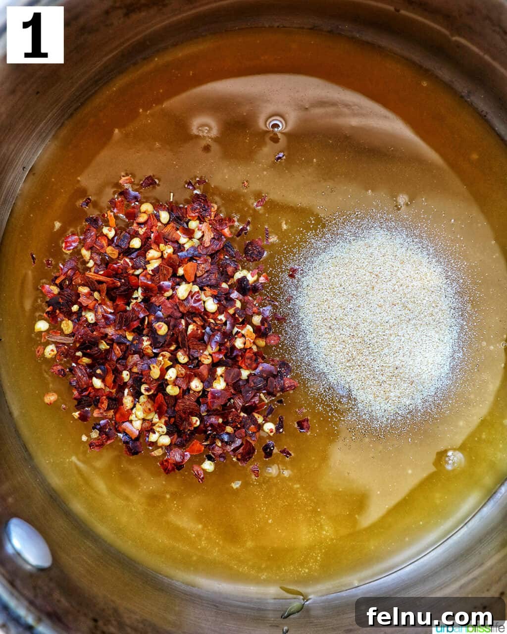 Ingredients for Hot Honey Sauce in a saucepan, separate but ready to be mixed.