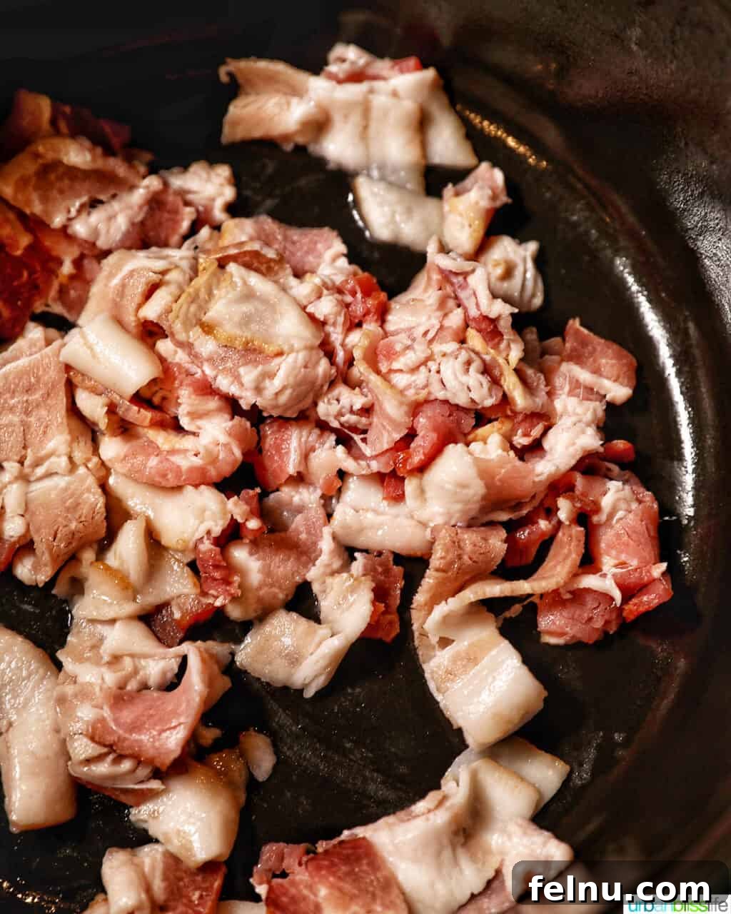 Creamy Baby Potato Salad with Crispy Bacon 6 cooking bacon in a pot until crispy