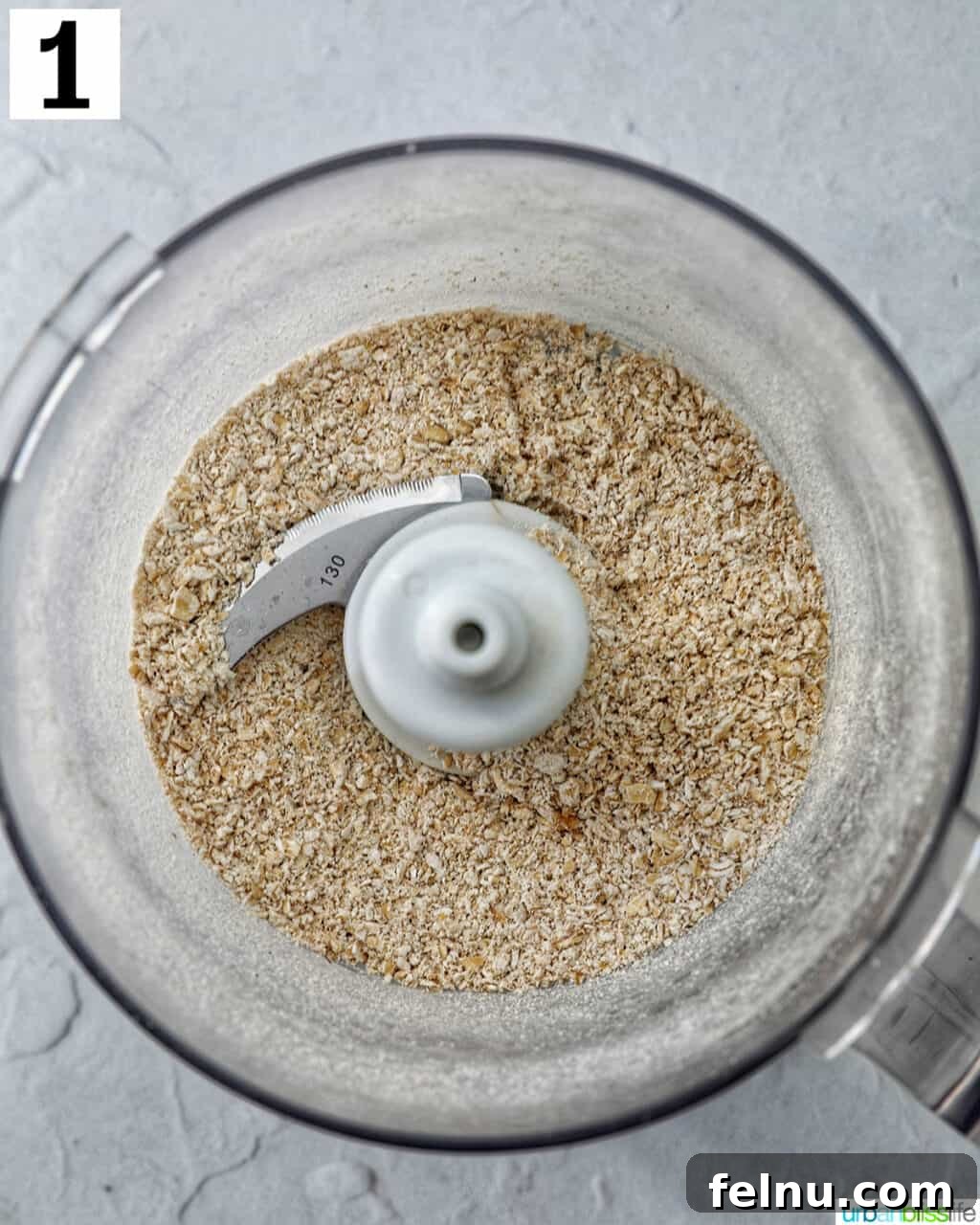 Happy Hound Blueberry Treats 5 Step 1: Oats in a food processor.
