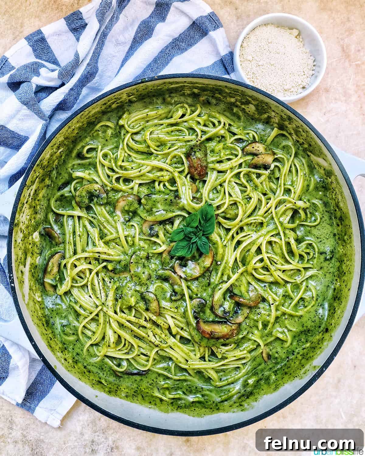 Earthy Mushroom Pesto Pasta 19 Large pan filled with creamy mushroom pesto pasta, ready to be served.