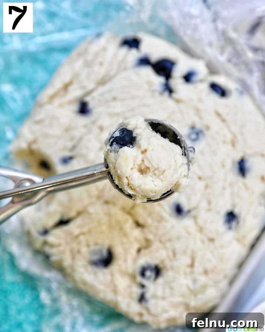 Lemon Blueberry Bliss Cookies 16 Scoop of lemon blueberry cookie batter above the rest of the cookie batter.