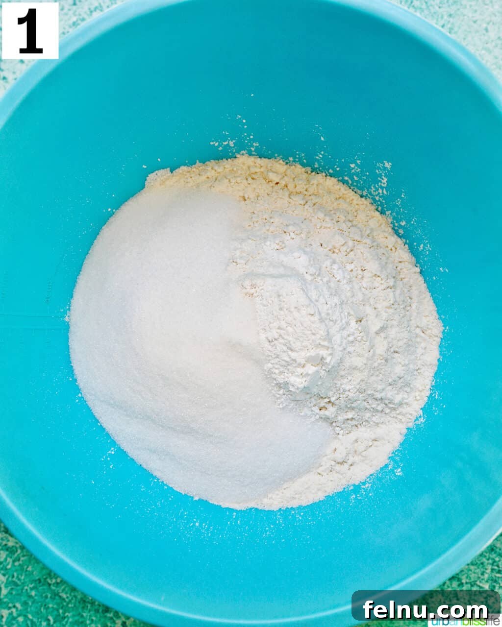 Lemon Blueberry Bliss Cookies 5 Blue bowl with dry ingredients to make lemon blueberry cookies.