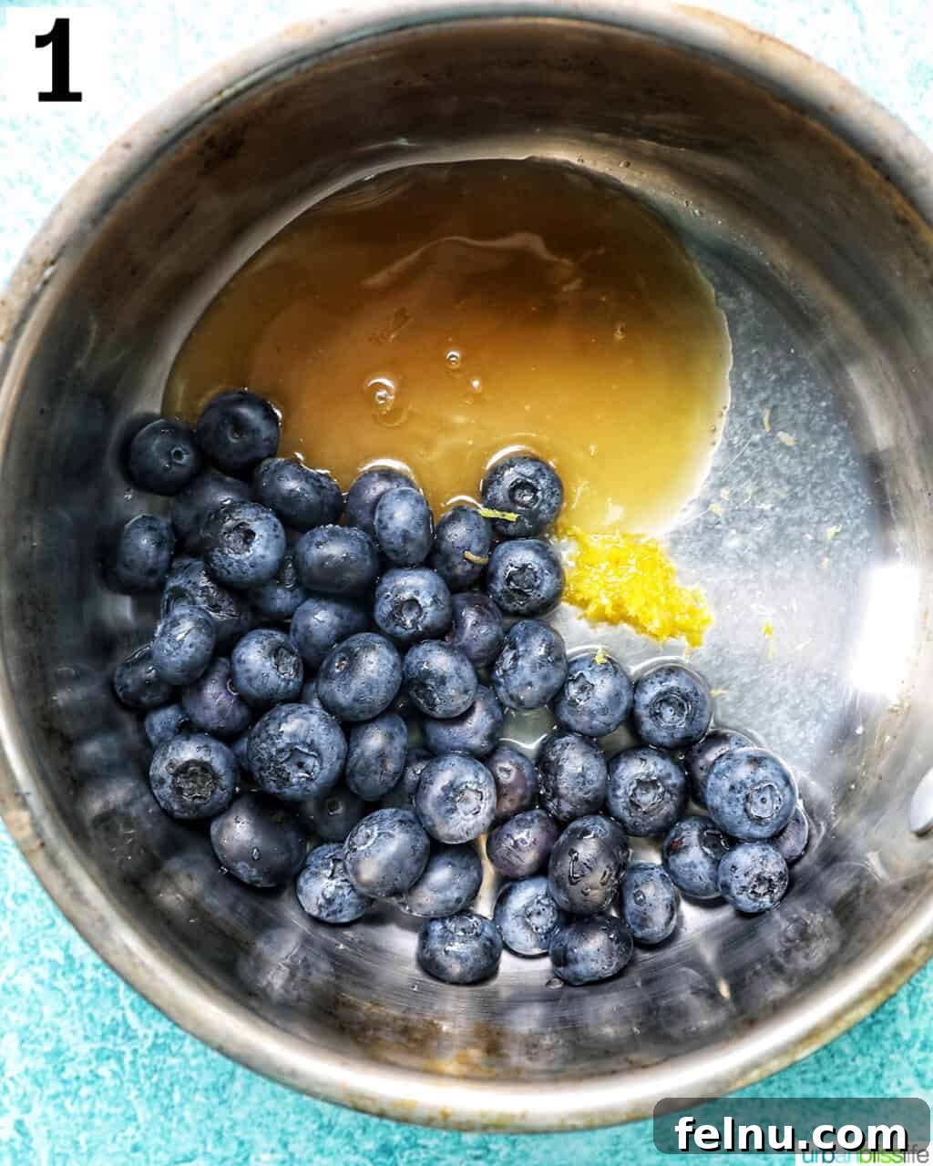 Blueberry Bliss Toast 5 Fresh blueberries in a small saucepan, ready to be cooked.