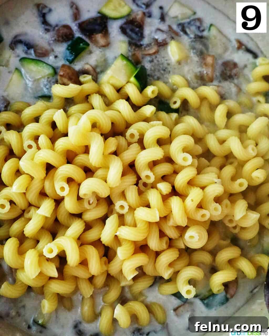 Zucchini and Mushroom Pasta Primavera 13 Adding Pasta for Zucchini Mushroom Pasta