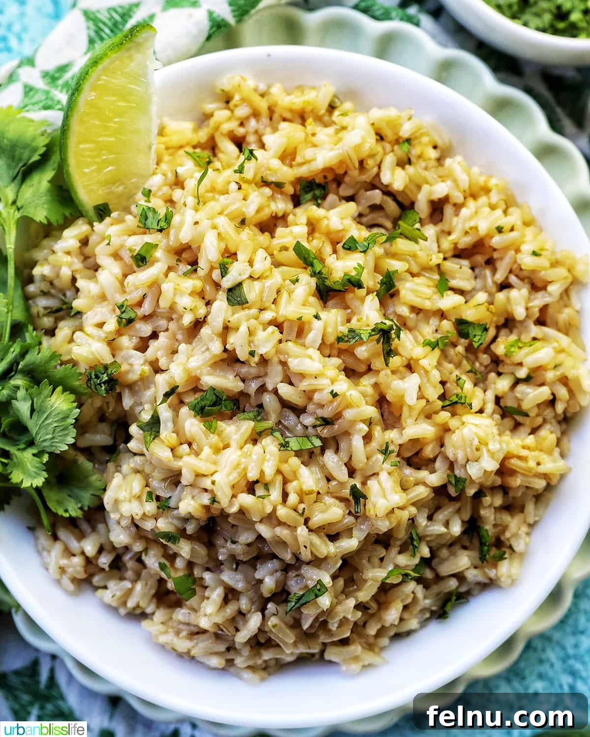 Zesty Cilantro Lime Brown Rice in Your Instant Pot 2 Instant Pot Cilantro Lime Brown Rice in a white bowl