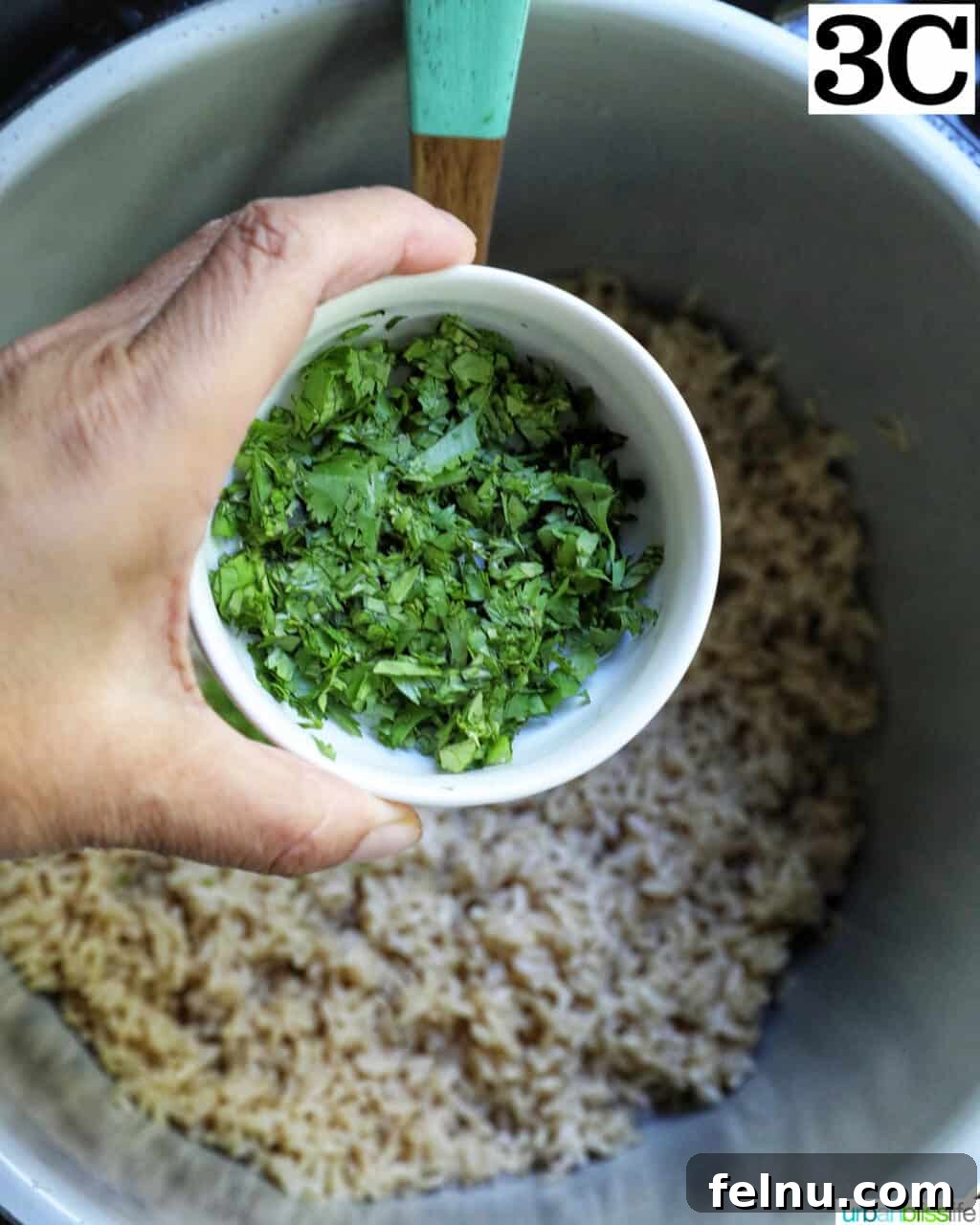 Zesty Cilantro Lime Brown Rice in Your Instant Pot 9 Adding chopped cilantro to brown rice in Instant Pot