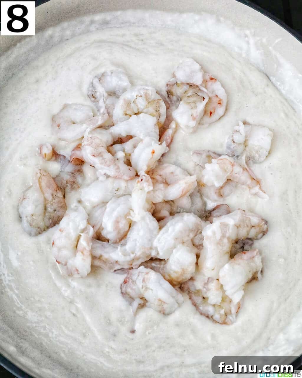 Tuscan Shrimp Gnocchi Delight 13 Shrimp being cooked in the sauce.